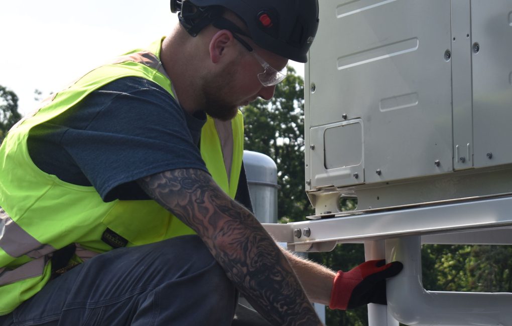 Man working on HVAC system